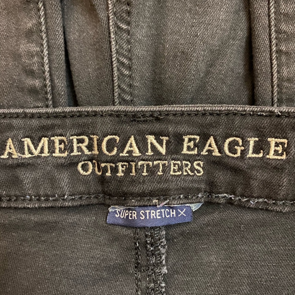 American Eagle Black Jeans with frayed knee rips